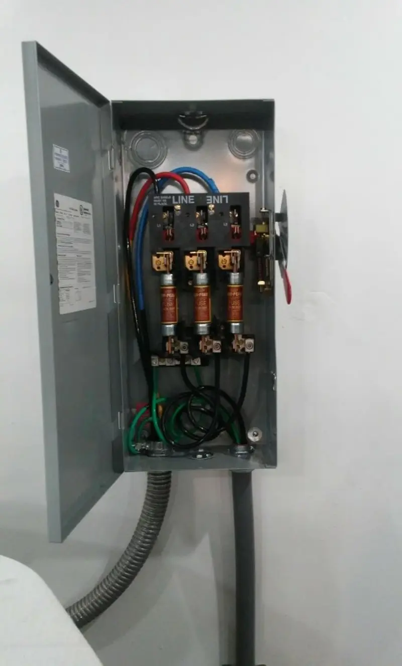 Three-phase disconnect switch installed for Smoke Detector Installation in Astoria